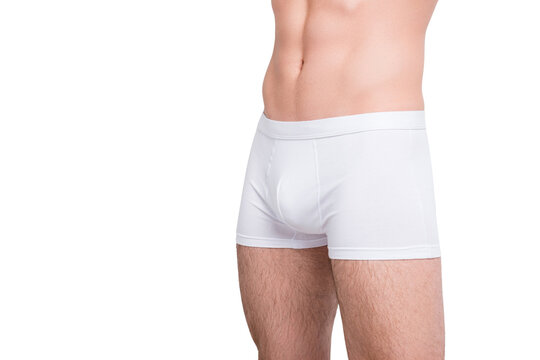 Masculinity nude people person abs pecs model fashion concept. Cropped close up photo of man's strong muscular legs wearing white classic boxer-shorts isolated on gray background copy-space cutout