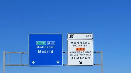 A directional road sign on the A-2 motorway in Spain, indicating the directions to Medinaceli and Madrid, as well as exit 186 for Almazán.September 11, 2026 © GenadiyGM