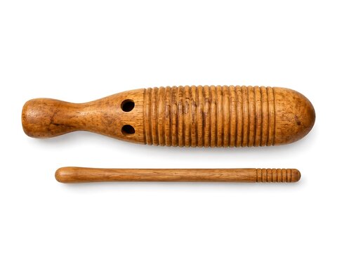 A wooden guiro percussion instrument with a matching wooden stick isolated on a white background, for musical performance, and rhythm practice