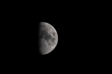 Detailed View of First Quarter Moon Isolated on Black Night Sky © Joeri