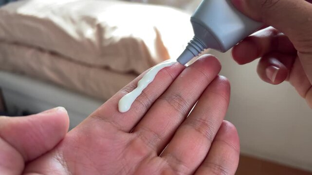 Applying sunscreen using two finger rule