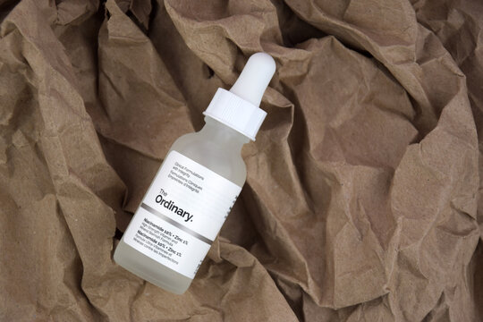The ordinary cosmetic on the craft background.