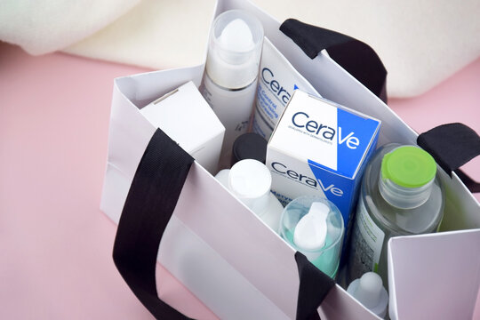 CeraVe cosmetics in the white package on the pink background.