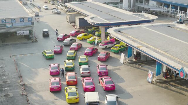Taxis queuing at a gas station in Bangkok traffic jam