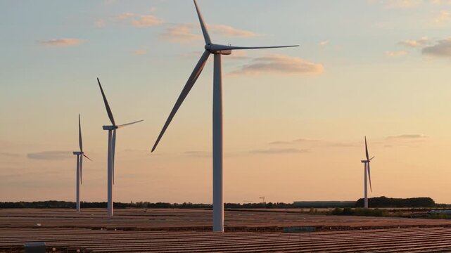 Chelveston Solar and Wind Renewable Energy Farm in Golden Evening Sunlight View