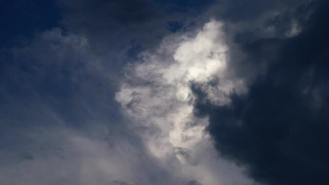 Dark Blue Storm Clouds Swirling Across Dramatic Moody Sky