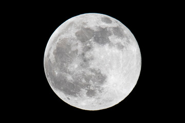 Detailed close-up view of the full moon in night sky © Joeri