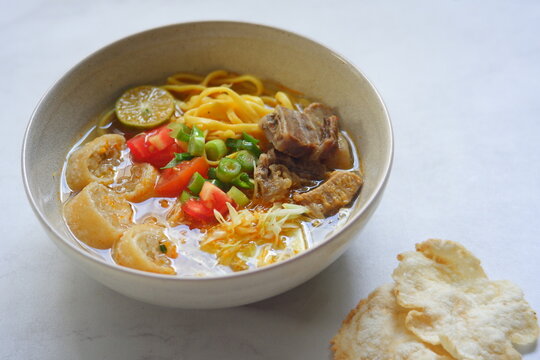 A bowl of soto mie Bogor 