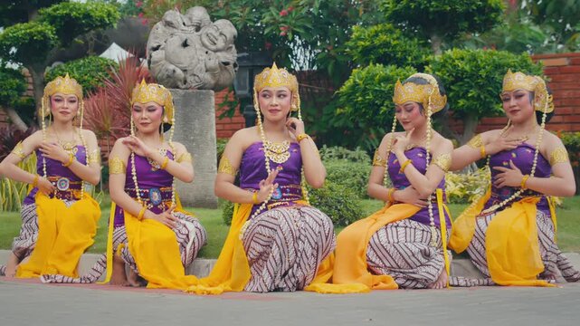 Synchronized 'Sembahan' Greeting Gesture by Sitting Dancers