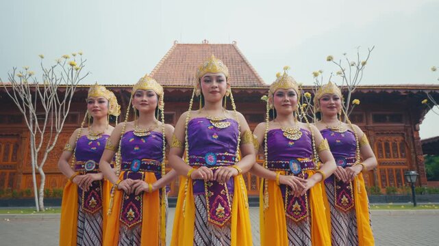 Five Beautiful Dancers Standing in V-Formation Smiling at Camera