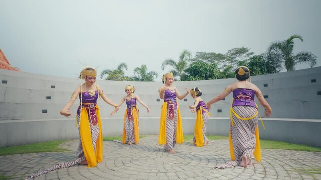 Circle Formation of Traditional Dancers Standing in Outdoor Amphitheater