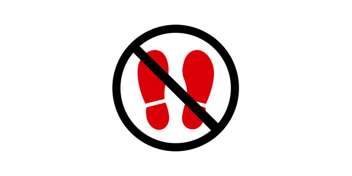 Red foot print inside prohibited circle sign warning not to step here.