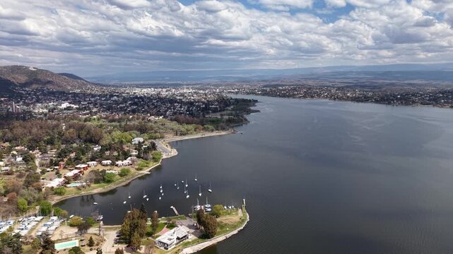 Aerial view of Villa Carlos Paz waterfront and San Roque lake in Cordoba Argentina