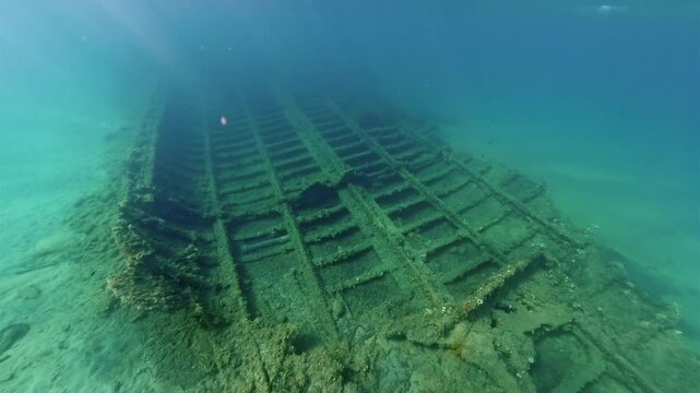 Underwater 4K gliding shot over the historic Milo shipwreck from WWI in Canakkale, Turkey.