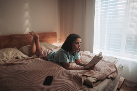 Woman Enjoying Morning Reading, Caucasian Female Enjoying Quiet Morning With Literature And Comfort
