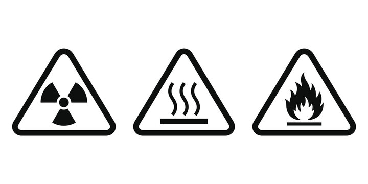 Hazard warning signs including radiation, heat and fire symbols for safety alerts.