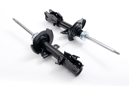 Black front shock absorbers for car.
