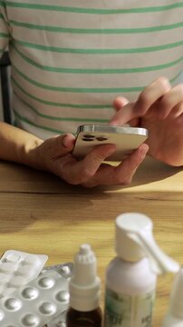 Online Medication Ordering with Electronic Prescription on Smartphone. Woman Using App to Make an Order on Website