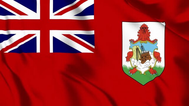 Waving flag of Bermuda with red field union jack and coat of arms fabric texture island territory