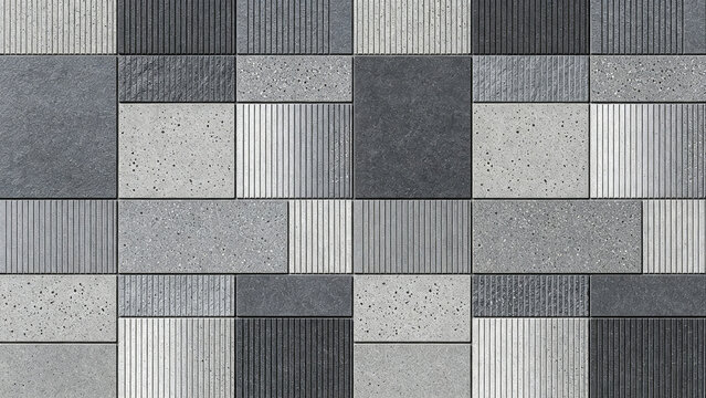 Grey ceramic tile wall with ribbed and speckled textures, industrial minimalist surface,Suitable for interior design.