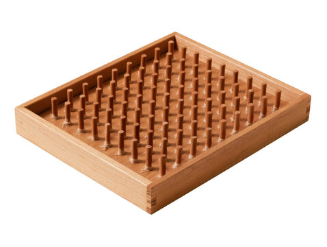 A high angle view of a classic strategy puzzle featuring numerous vertical wooden pegs arranged in a precise grid pattern on a light timber base