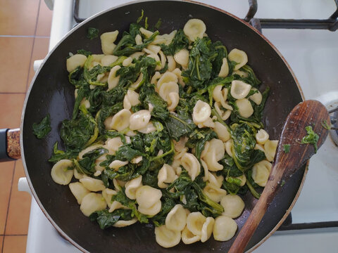 typical handmade pasta from southern Italy called orecchiette, served with broccoli rabe