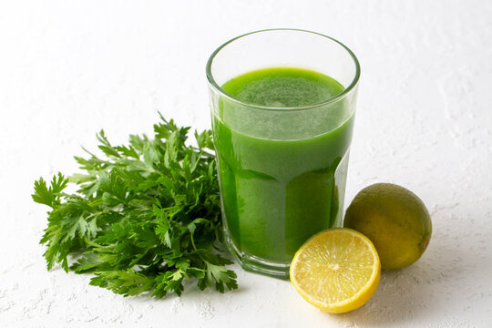 Green healthy detox, lemon and parsley juice. Green vegetable smoothie