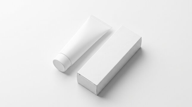 Blank white cosmetic tube with packaging box isolated on white background