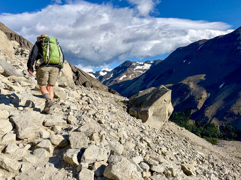 Rear view of a Hiker on the Las Torres Base Viewpoint trail, Torres del Paine National Park, Chile
