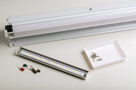 An isolated ceiling light fixture resting on a clean service