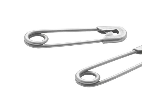 Two vintage-style metal safety pins with smooth rounded ends and split ends against clean white