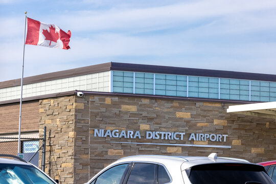 Niagara Falls, Canada, August 25, 2026; The terminal building flying the Canadian flag at Niagara District Airport, code YCM, , a regional airport in Ontario, Canada
