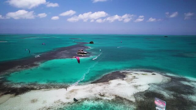 Aerial view of kite surfers in Los Roques archipelago, Venezuela.