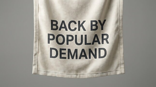 A banner with text back by popular demand hanging against a neutral background representing return