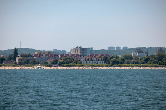 Sopot, Poland - July 16, 2026: Baltic seaside resort of Sopot stretches along the Bay of Gdańsk with beaches, waterfront buildings and sailboats offshore.