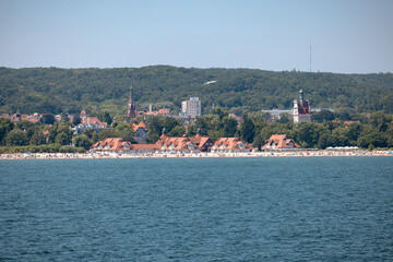 Sopot, Poland - July 16, 2026: Baltic seaside resort of Sopot stretches along the Bay of Gdańsk with beaches, waterfront buildings and sailboats offshore. © Torval Mork