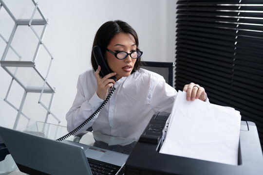 Asian business woman at office.