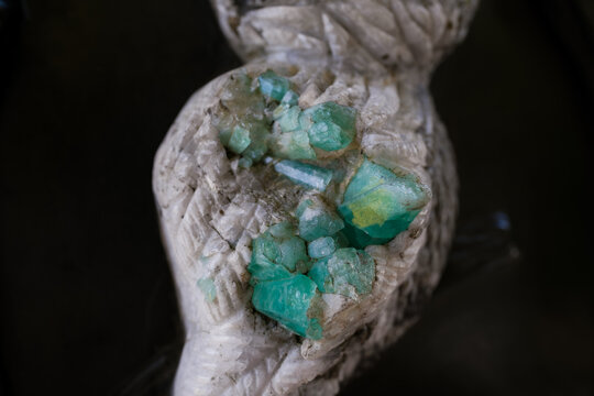 Rough emerald crystals forming beautiful mineral texture