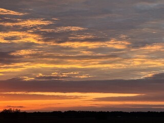 Fototapeta premium Fantastic sunset sky, colorful clouds, natural sunset sky background