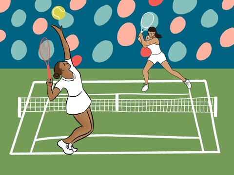 Two Women Play Tennis on a Court During the Day