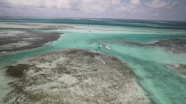 Aerial view of kitesurfers in Los Roques archipelago, Venezuela.