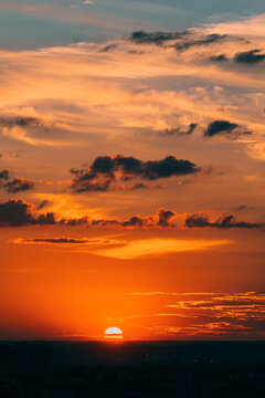 Sunset over the horizon with clouds