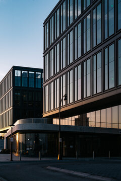 Glass building reflecting the sky