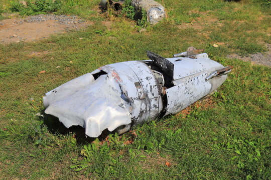 War in Ukraine. Wreckage of Russian missile on grass in Dnipro, Ukraine. Remains of an exploded military ballistic or cruise rocket.