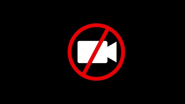 Prohibited Video Symbol Animation on Black Background with Subtle Zoom Effect