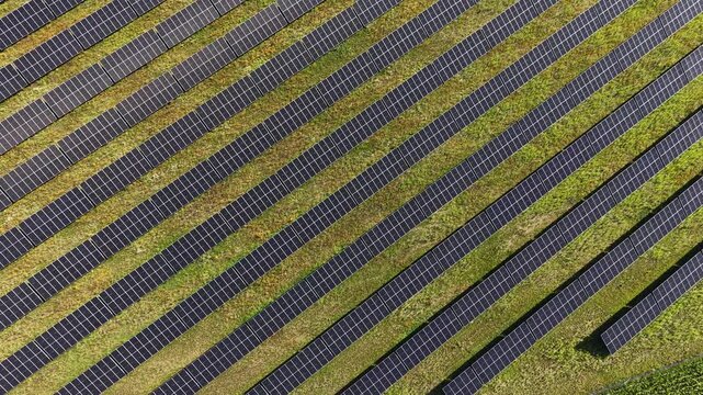 Aerial top down perspective of clean solar power field