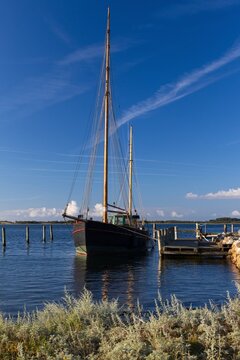 Traditional fishing cutter in the harbor of Langor, Samso