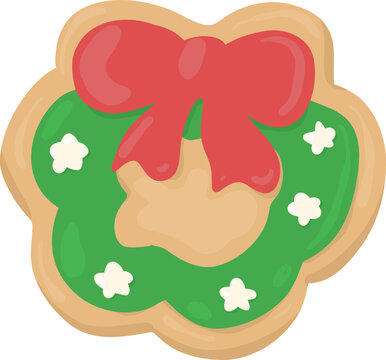 Sweet baked Christmas wreath shaped cookie decorated with green icing and a red bow for holiday treats