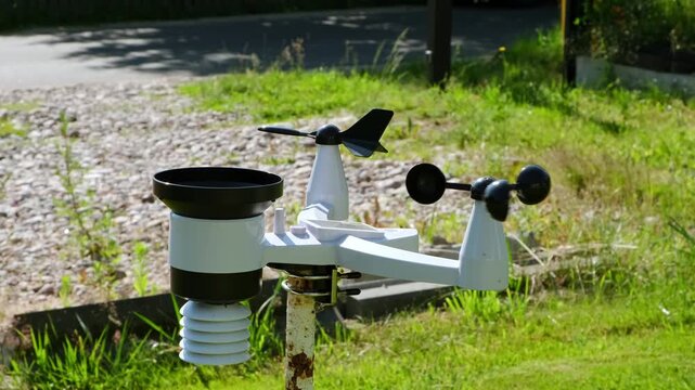 Modern wireless weather station. There are sensors of temperature and humidity, Wind speed and direction, Rain gauge and snow sensors. Solar panel. Meteorological equipment, smart home technology. 4K.
