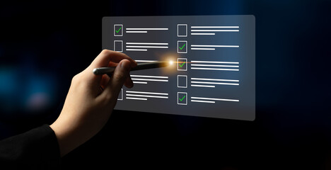 A hand uses a pen to mark items on a digital checklist with glowing checkmarks, representing efficiency and dedication to task completion in a modern work setting. Cyphers © InfiniteFlow